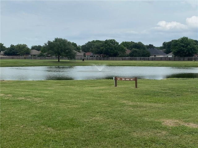 109 Dove Ct, Navasota, TX 77868 - water view featuring fence