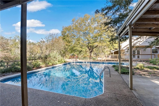 view of pool featuring a patio area