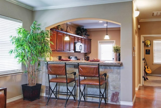 kitchen with pendant lighting, crown molding, dark wood-type flooring, and kitchen peninsula