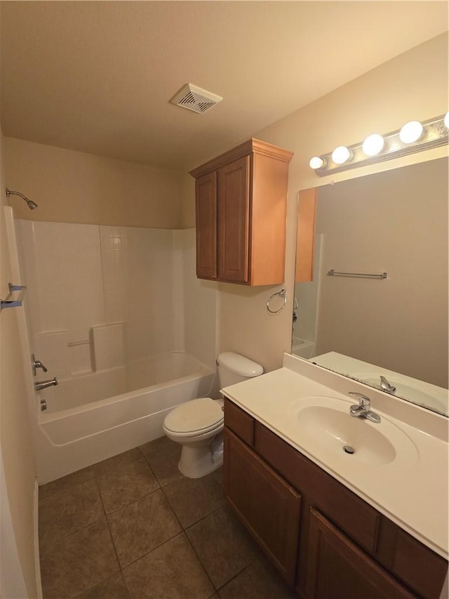 full bathroom featuring tile patterned flooring, vanity, toilet, and tub / shower combination