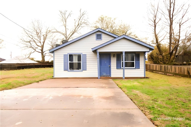 view of front of home with a front yard