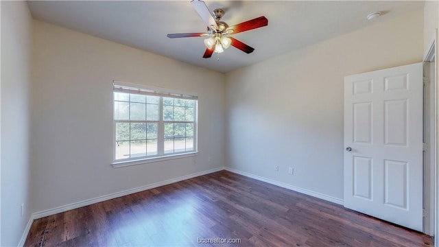 2487 Horse Shoe Dr, College Station, TX 77845 - unfurnished room with ceiling fan, dark wood-type flooring, baseboards, and a smoke detector