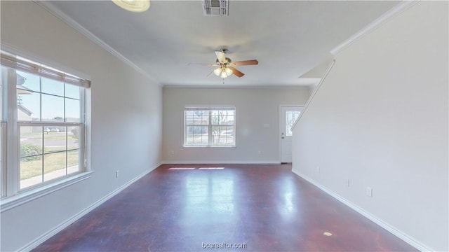 2487 Horse Shoe Dr, College Station, TX 77845 - empty room with ornamental molding, ceiling fan, finished concrete flooring, and baseboards