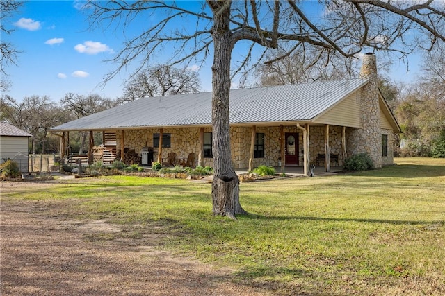 ranch-style house featuring a front yard