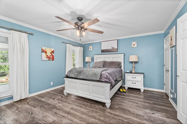 87 Tonkawa Dr, Normangee, TX 77871 - bedroom featuring crown molding, multiple windows, dark wood-style floors, and baseboards
