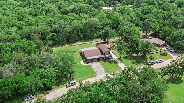 87 Tonkawa Dr, Normangee, TX 77871 - aerial view of property's location with a heavily wooded area