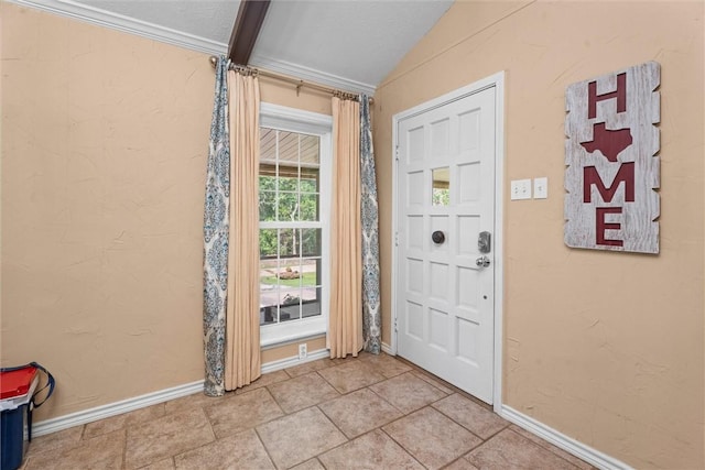 87 Tonkawa Dr, Normangee, TX 77871 - entryway featuring lofted ceiling and baseboards