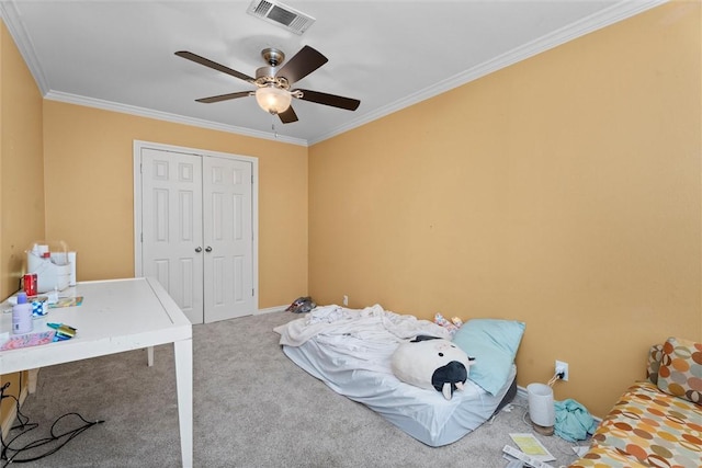 87 Tonkawa Dr, Normangee, TX 77871 - carpeted bedroom with ornamental molding, a closet, and ceiling fan