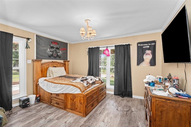 87 Tonkawa Dr, Normangee, TX 77871 - bedroom featuring a chandelier, light wood-style floors, ornamental molding, and multiple windows