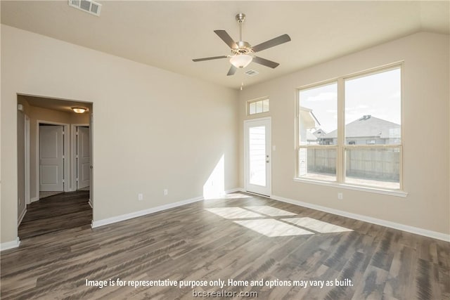 unfurnished room with ceiling fan, dark hardwood / wood-style flooring, and vaulted ceiling