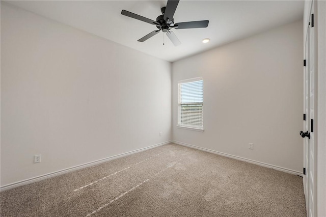 unfurnished room with carpet flooring