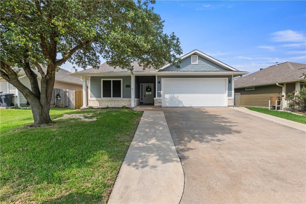 1016 Windmeadows Dr, College Station, TX 77845 - view of front of property with driveway and a garage