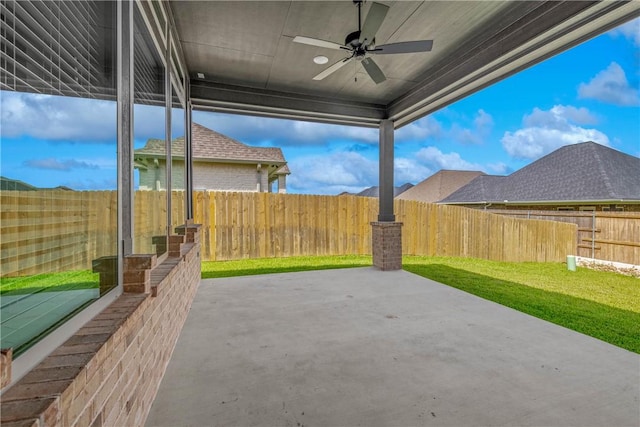 3576 Chantilly Path, Bryan, TX 77808 - fenced backyard with a ceiling fan and a patio area