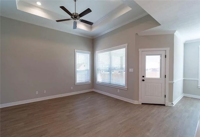 2130 Mountain Wind Loop, Bryan, TX 77807 - foyer entrance with crown molding, a raised ceiling, wood finished floors, a ceiling fan, and recessed lighting