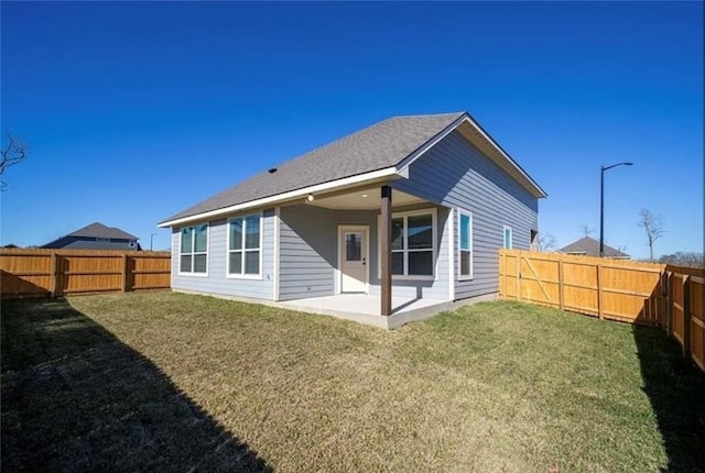 2130 Mountain Wind Loop, Bryan, TX 77807 - rear view of house featuring a fenced backyard and a patio