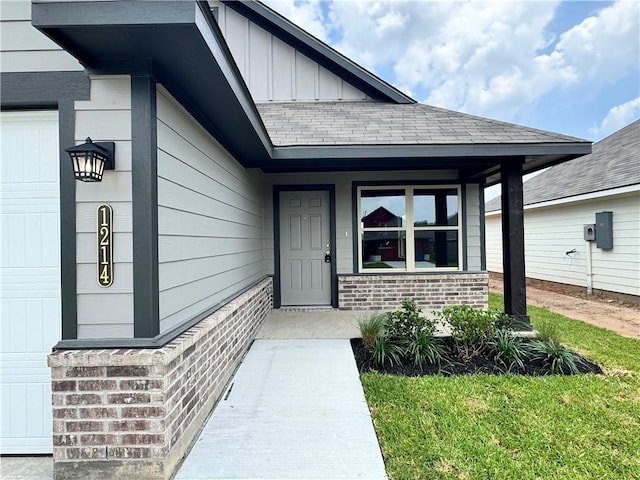 1214 Highgarden Dr, Navasota, TX 77868 - entrance to property featuring a porch, a shingled roof, and board and batten siding