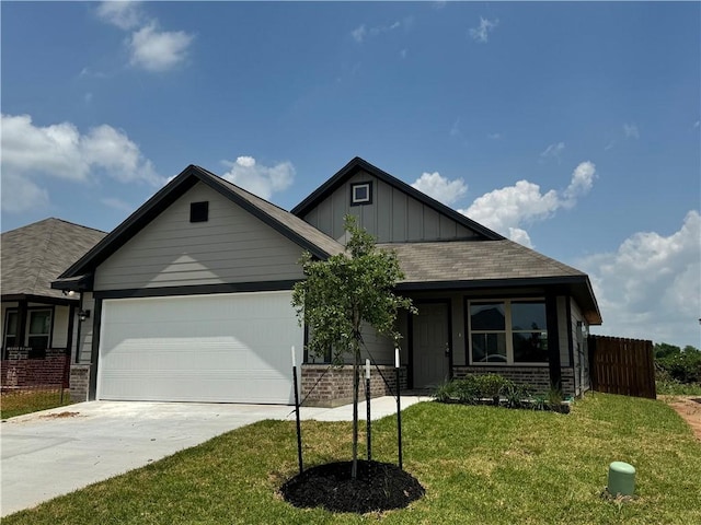 1214 Highgarden Dr, Navasota, TX 77868 - craftsman inspired home with fence, a front yard, board and batten siding, an attached garage, and driveway