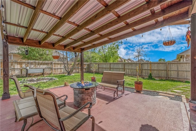 view of patio featuring a fire pit