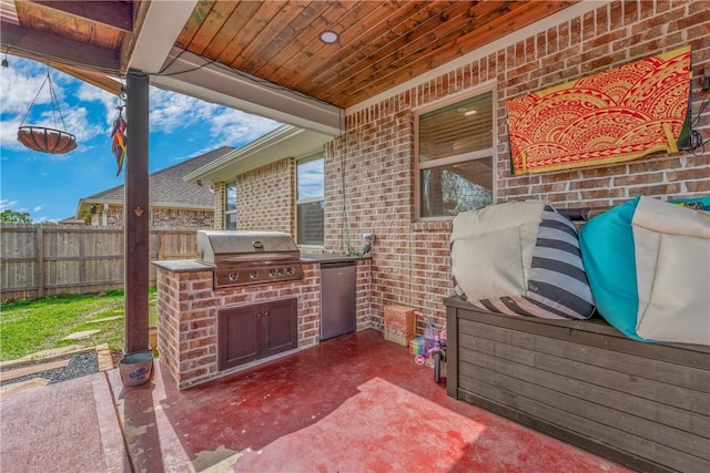 view of patio with grilling area and exterior kitchen