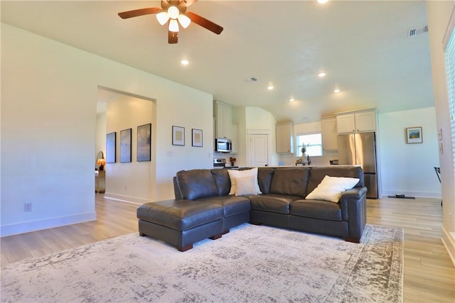 172 Pleasant Path, Somerville, TX 77879 - living room with light wood-style flooring, ceiling fan, baseboards, and recessed lighting