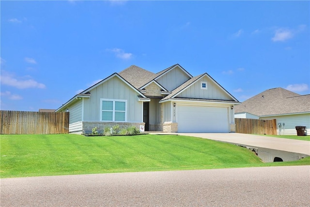 172 Pleasant Path, Somerville, TX 77879 - view of front facade with board and batten siding, concrete driveway, and an attached garage