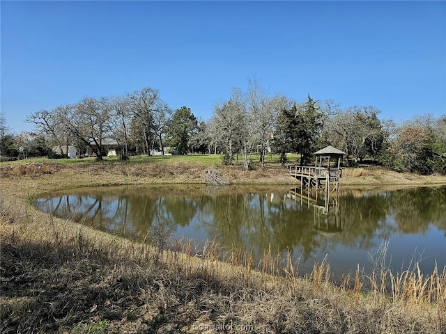 property view of water with a gazebo