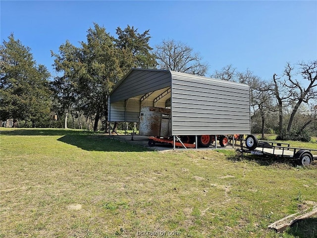 view of yard with a carport