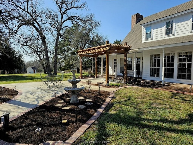 view of yard featuring a pergola and a patio