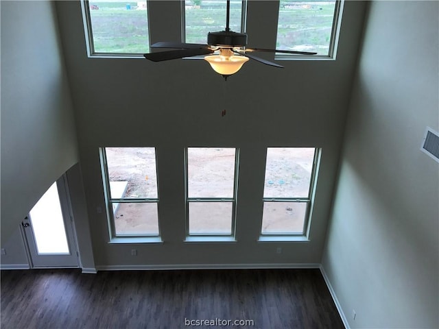 interior space featuring hardwood / wood-style flooring and ceiling fan