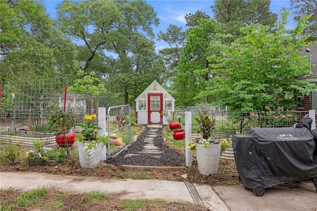 2092 Fm 1486th Rd, Anderson, TX 77830 - view of playground featuring a garden, an outbuilding, and fence