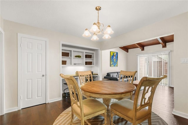 dining area with an inviting chandelier, beam ceiling, dark wood-style floors, and baseboards