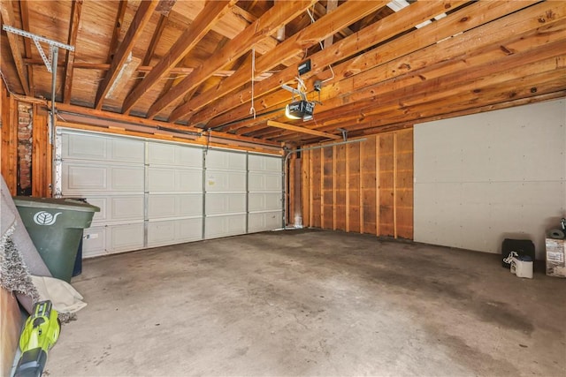 garage featuring a garage door opener