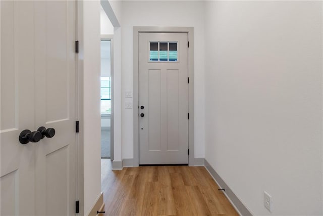 doorway to outside featuring light hardwood / wood-style floors