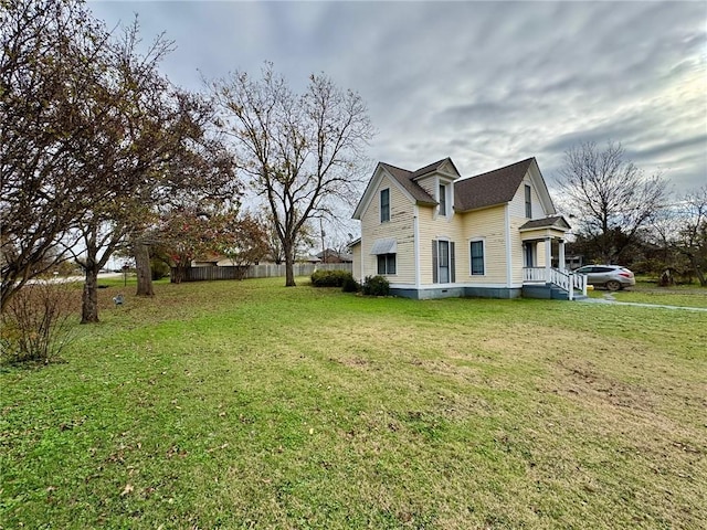 view of property exterior with a lawn