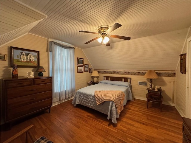 bedroom with hardwood / wood-style floors, ceiling fan, lofted ceiling, and wood ceiling