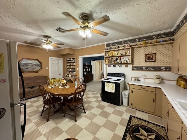 kitchen with a textured ceiling, white appliances, and ornamental molding