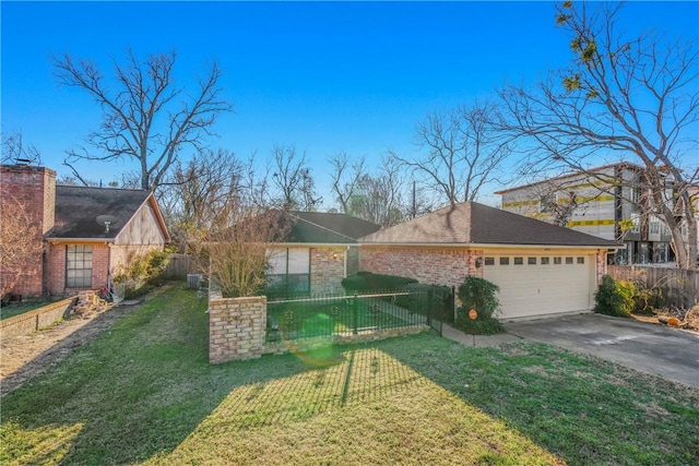 view of front of house with a garage and a front yard