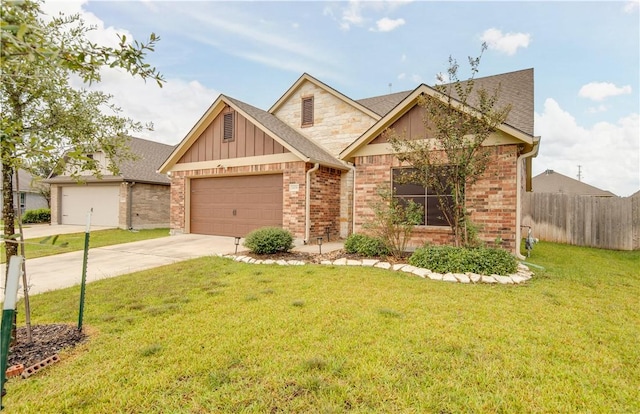 view of front of home with a garage and a front yard