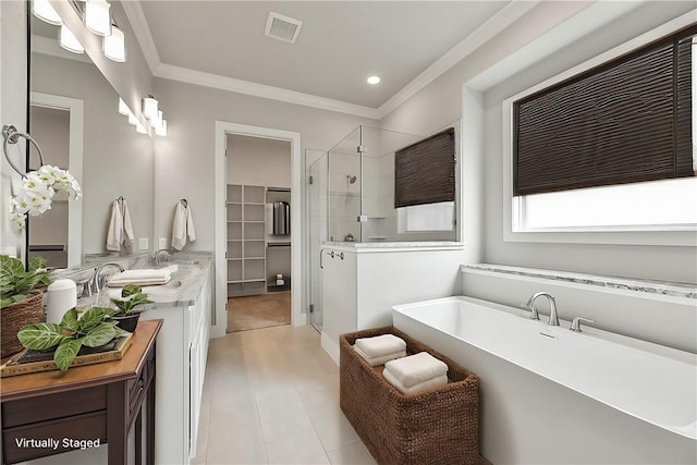 bathroom featuring plus walk in shower, vanity, and crown molding