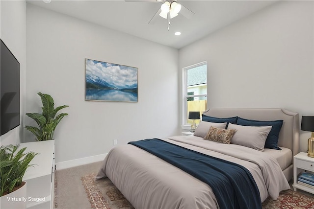 bedroom with carpet flooring and ceiling fan