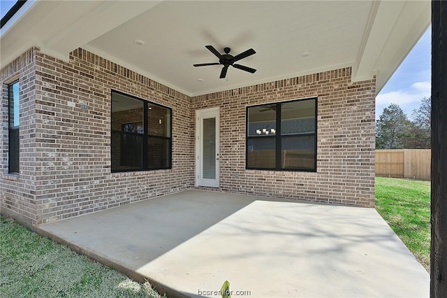 view of patio featuring ceiling fan