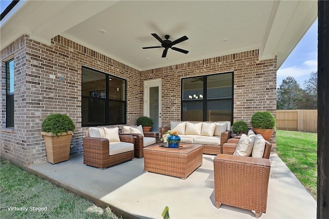 view of patio / terrace with outdoor lounge area and ceiling fan