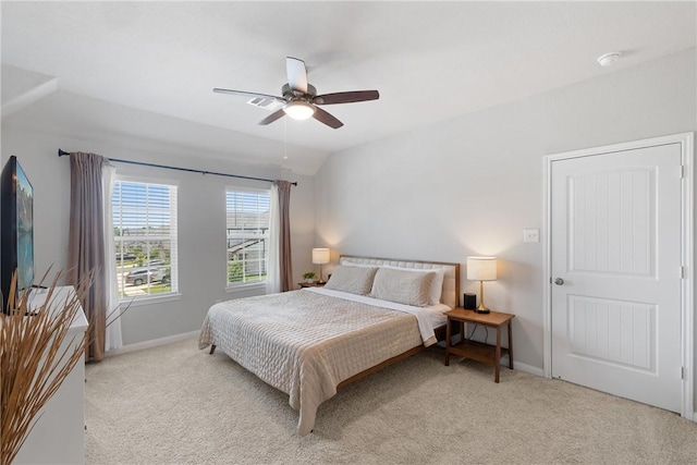 5745 Cerrillos Dr, Bryan, TX 77807 - bedroom featuring light colored carpet, baseboards, and a ceiling fan