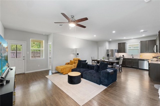 5745 Cerrillos Dr, Bryan, TX 77807 - living room with a ceiling fan, wood finished floors, recessed lighting, and baseboards