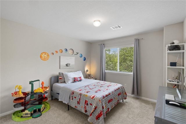 5745 Cerrillos Dr, Bryan, TX 77807 - bedroom featuring carpet floors and baseboards
