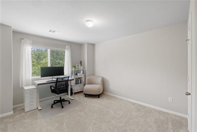 5745 Cerrillos Dr, Bryan, TX 77807 - carpeted home office with baseboards