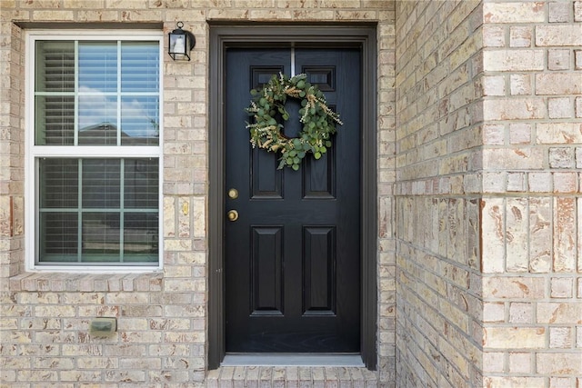 5745 Cerrillos Dr, Bryan, TX 77807 - entrance to property with brick siding