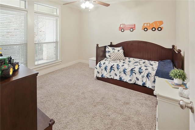 bedroom with ceiling fan and carpet flooring