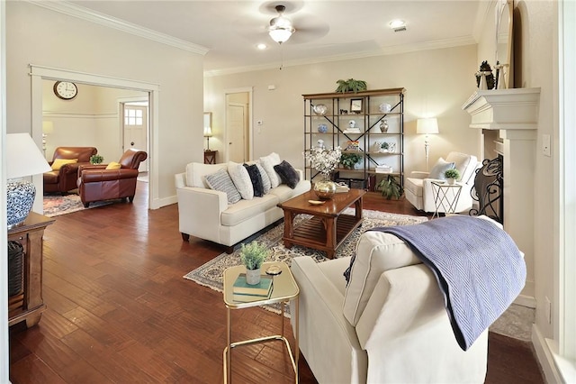 living room featuring ornamental molding, dark hardwood / wood-style floors, and ceiling fan