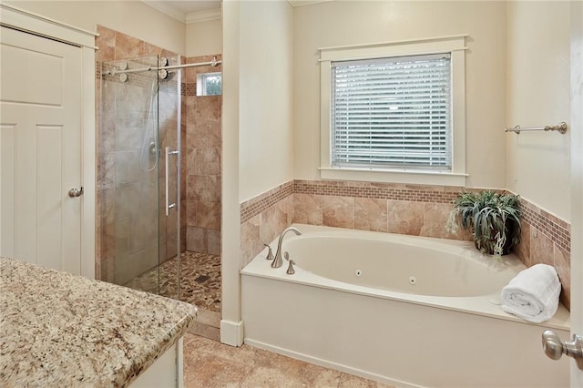 bathroom with shower with separate bathtub